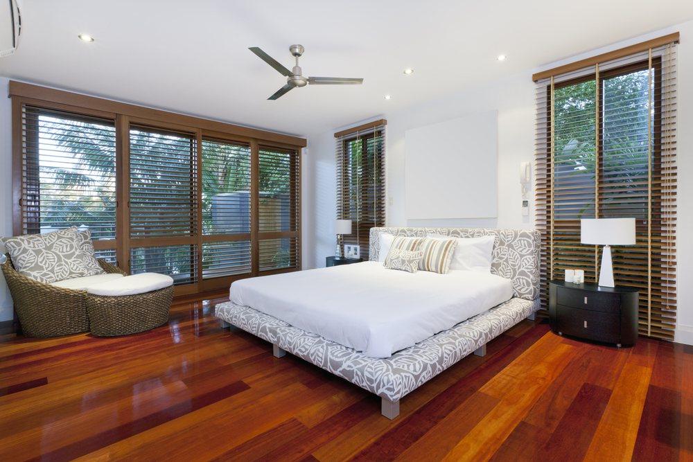 Modern master bedroom with wood floors - Interior Design Ideas