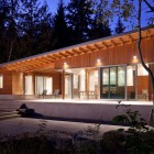 The Front Side of Shuswap Lake Cabin by Splyce Design Night Situation