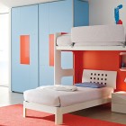 Cozy Blue Orange Bed Room with Mini Bookcase and Drum Sets