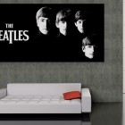 Beatles Poster and White Couch in Living Room