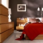 Cool Grey Bedroom with Red Bedcover and Wooden Furniture
