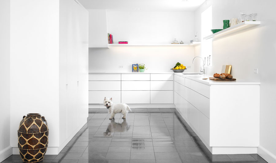 White Corian Kitchen with Marble Floors