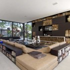 White Living Room with Bookshelves and Glass Wall