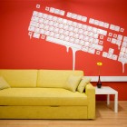 Yellow Couch with Mural Wallpaper Paint