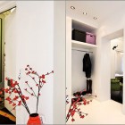 Corner Room with Red Branches Decorations Ideas