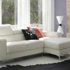 White Sofa and Natural Lit Living Room with Black Sofas