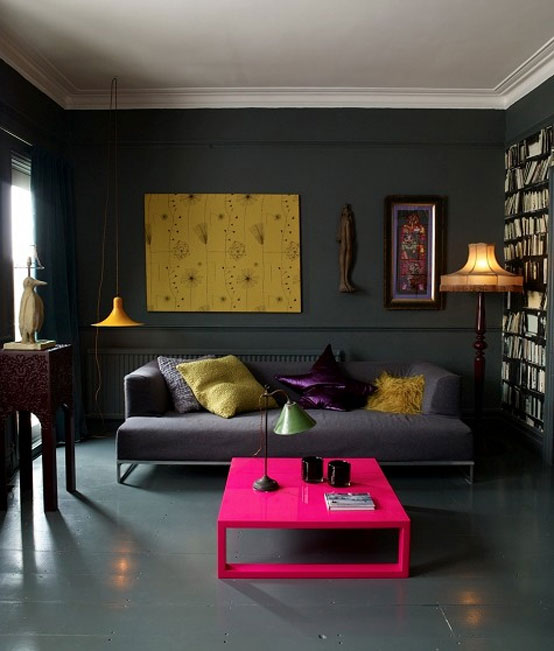 Dark and Moody Livinng Room Design with Pink Coffee Table