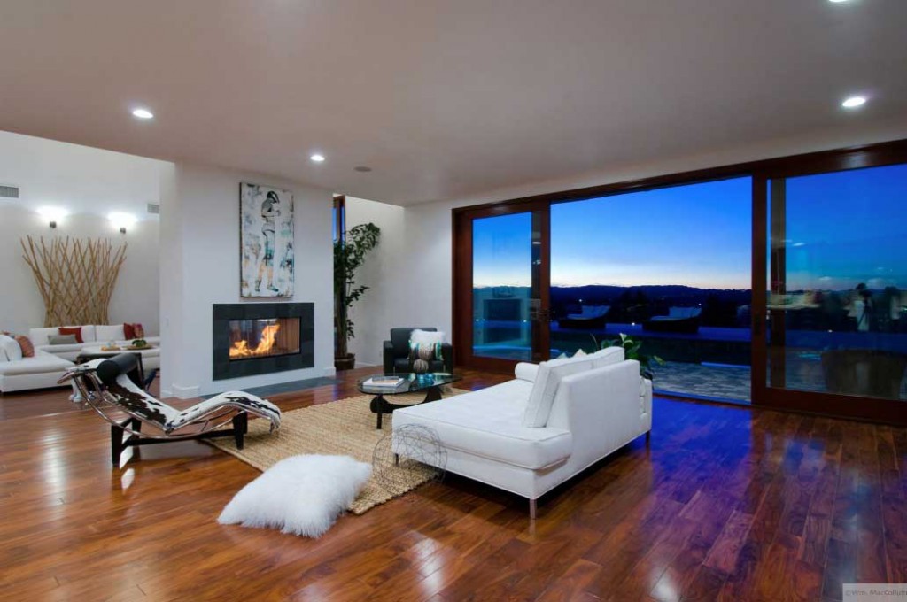 Living Room with White Sofas and Outdoor View