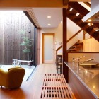 Zen Kitchen and Courtyard Design with Wooden Furniture Set