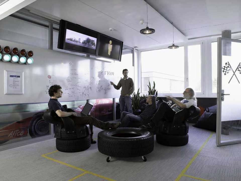 Informal Meeting Room with Unique Tire Sofa