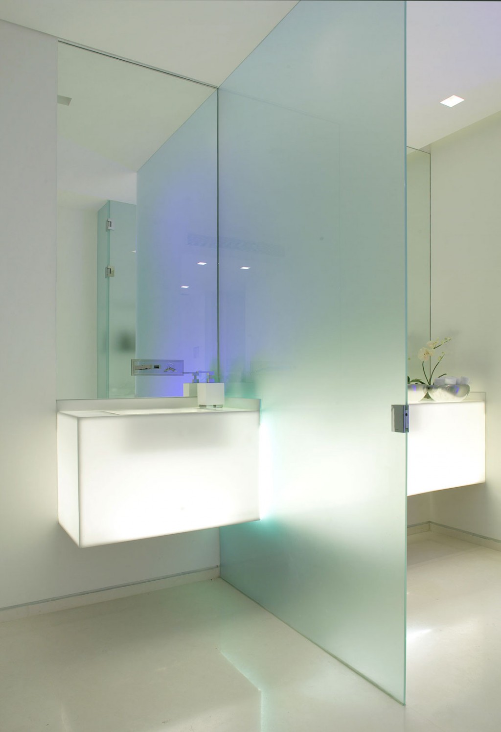 Wet Room with Modern Lighting and Glass Divider