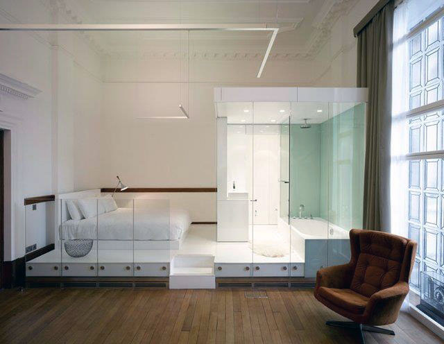 Unique White Bedroom Bed and Bathtub in One Area