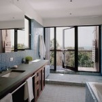 Bathroom Design with Blue Tile and Outdoor Deck