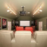 Captivating Movie Room with Green Wall Design