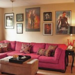 Small Movie Room Design with Pink Sofa and Movie Posters