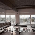 Bright Living Room Loft Design with Concrete Ceiling