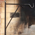 Classic Fireplace Exposed Brick Black Iron Cooking Fireplace Crane