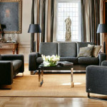 Black sofas with wood floor