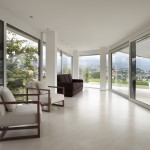 Glass house living room with view