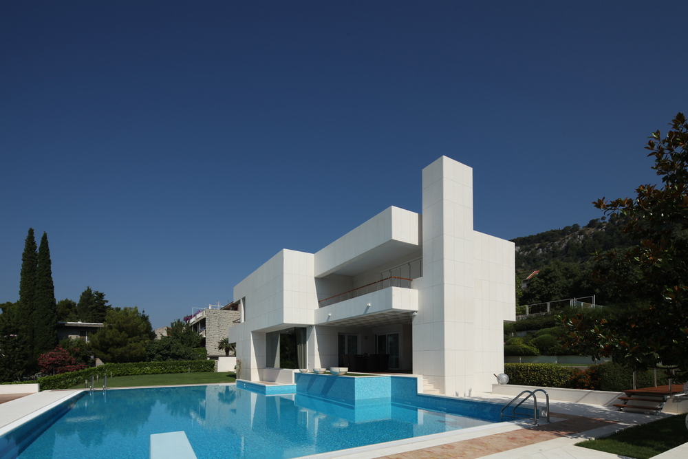 Modern square pool and house