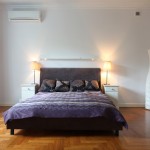 Wood floor bedroom with natural light